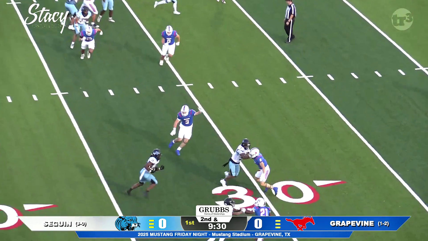 Running back Trotter (#9) breaks tackles but stopped short